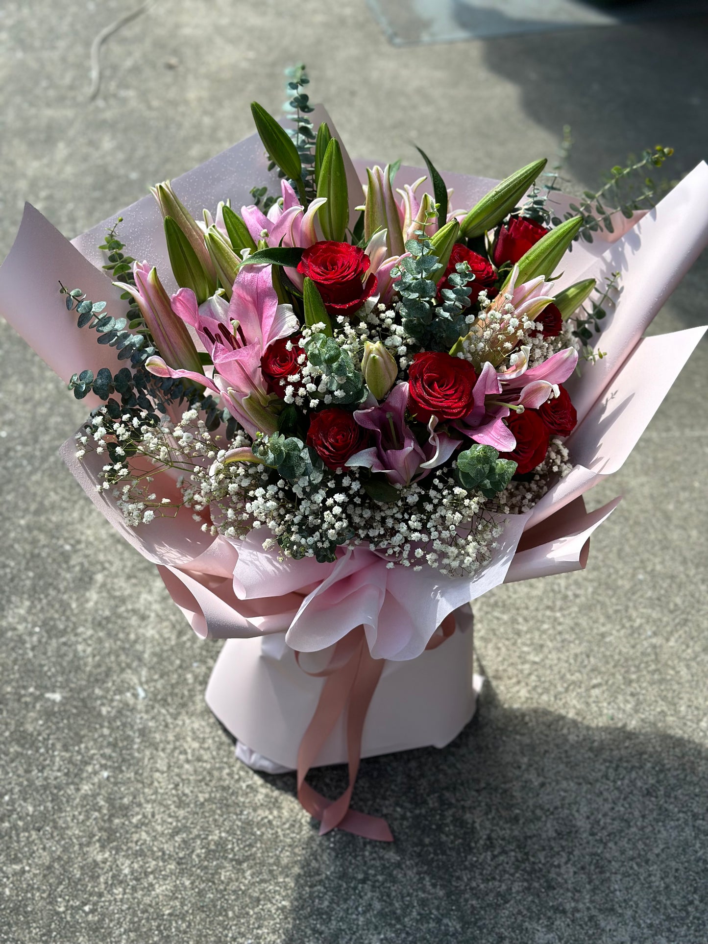 "Red Velvet" - Premium Lilies & Roses Hand Bouquet